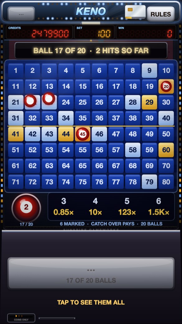 Keno: a blue board with red ball hits being drawn